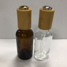 Garrafas de vidro do conta-gotas, OEM de madeira da garrafa dos cuidados com a pele do colar de 30ml Amber Essential Oil Bottle With