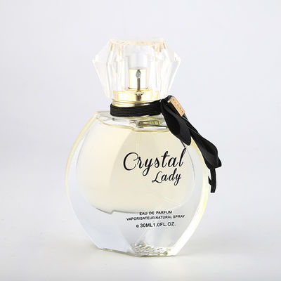 O perfume 100ml luxuoso vazio engarrafa a garrafa de vidro transparente do pulverizador