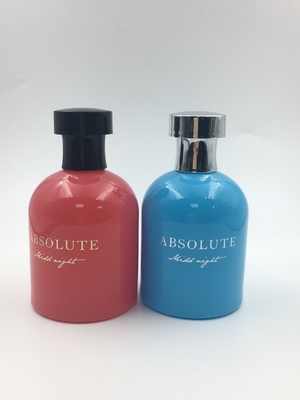 Round Shoulder Luxury Glass Perfume Bottle 100ml Blue Red Customized
