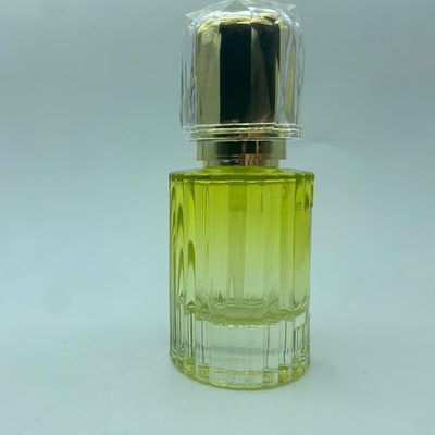 Frasco de loção de vidro premium amarelo de 40ml com frasco cosmético de bomba dourada OEM