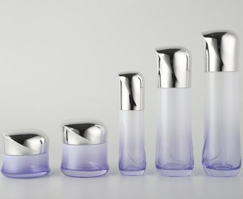 As garrafas cosméticas de vidro luxuosas com tampas/loção chapeadas frasco do creme engarrafam o empacotamento cosmético